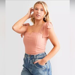 Free People Lola body suit. Size M. Pink.